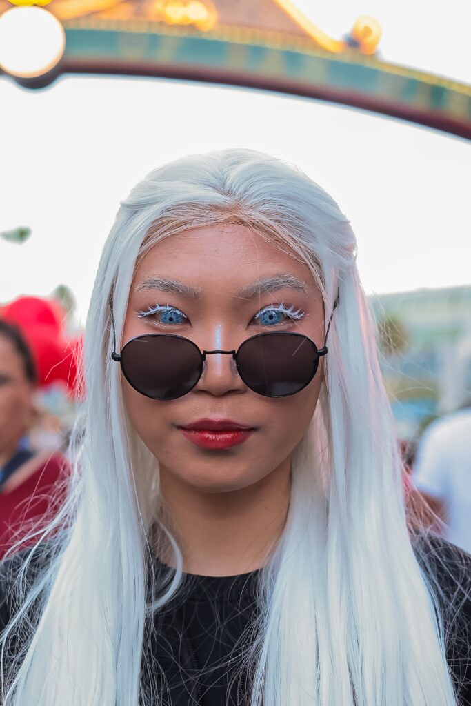 Storm Cosplayer close up with white hair and white contacts at ComiCon 2023